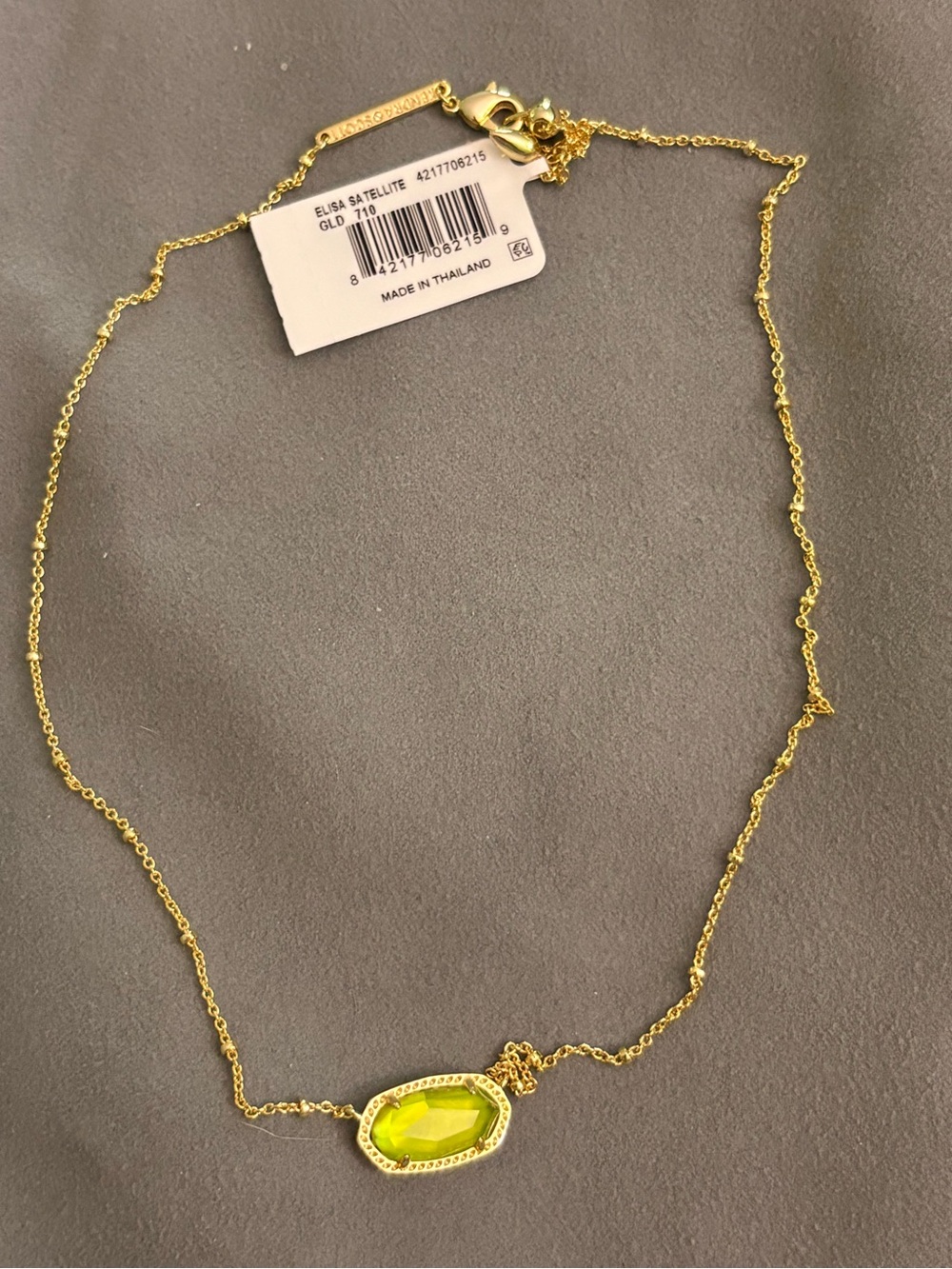 Kendra Scott Gold Necklace with peridot light Green Stone
